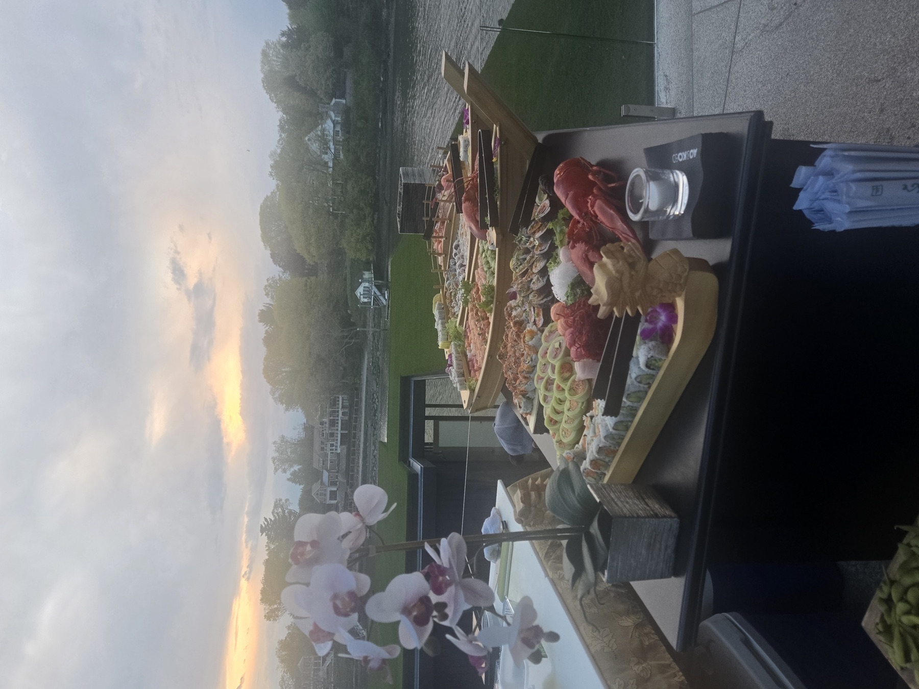 ARA NORI catering spread at sunset event